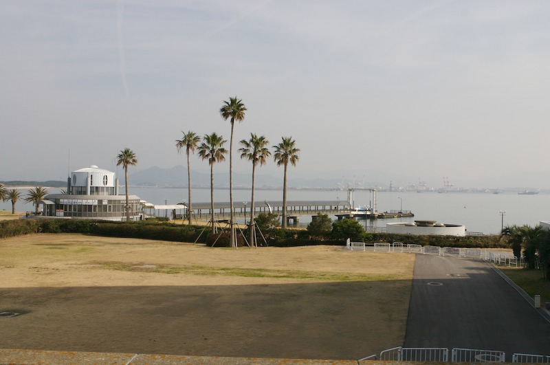 Standing on the balcony of the aquarium, looking out at (what I'll later find out) is the ferry port.