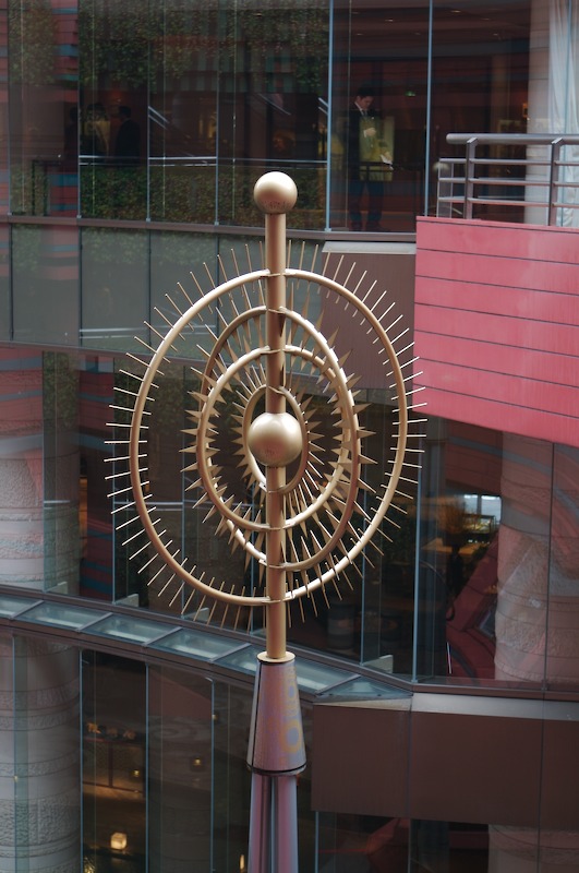 In the middle of each of four circles there are these statues coming up.