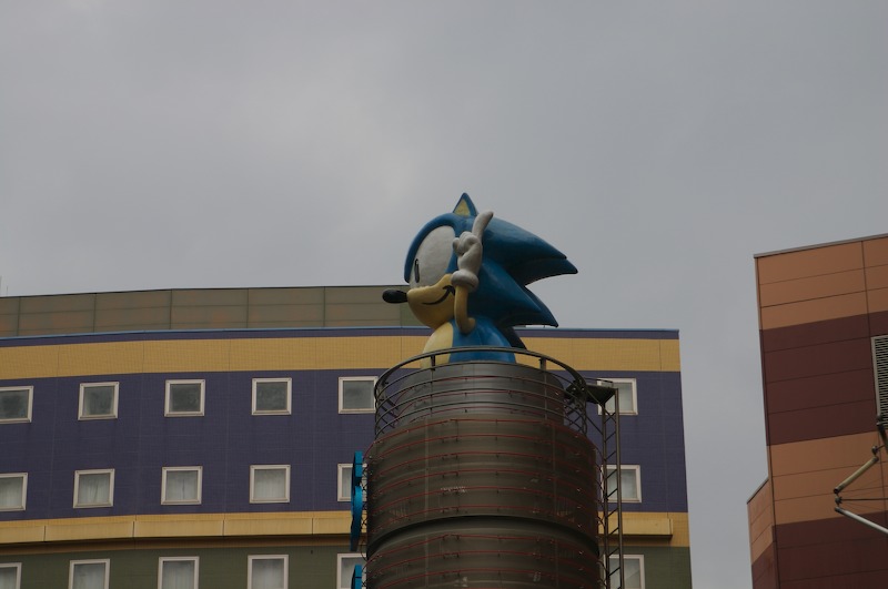 Sonic is giving the V sign for the picture.