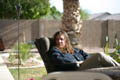 Courtny sitting outside (50mm, f/1.4, 1/4000 sec) <!--106_0667.CRW-->
