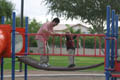 David and Mark playing on the jungle gym (50mm, f/8.0, 1/60 sec) <!--CRW_1834.CRW-->