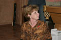 Mom watching someone else open a Christmas present (50mm, f/4.0, 1/60 sec, External flash) <!--CRW_1831.CRW-->

