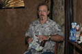 Paul opening a present [Dirty Minds] (50mm, f/4.5, 1/60 sec, External flash) <!--CRW_1826.CRW-->