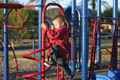 Mark in the park on the jungle gym (50mm, f/2.8, 1/800 sec) <!--106_0677.CRW-->
